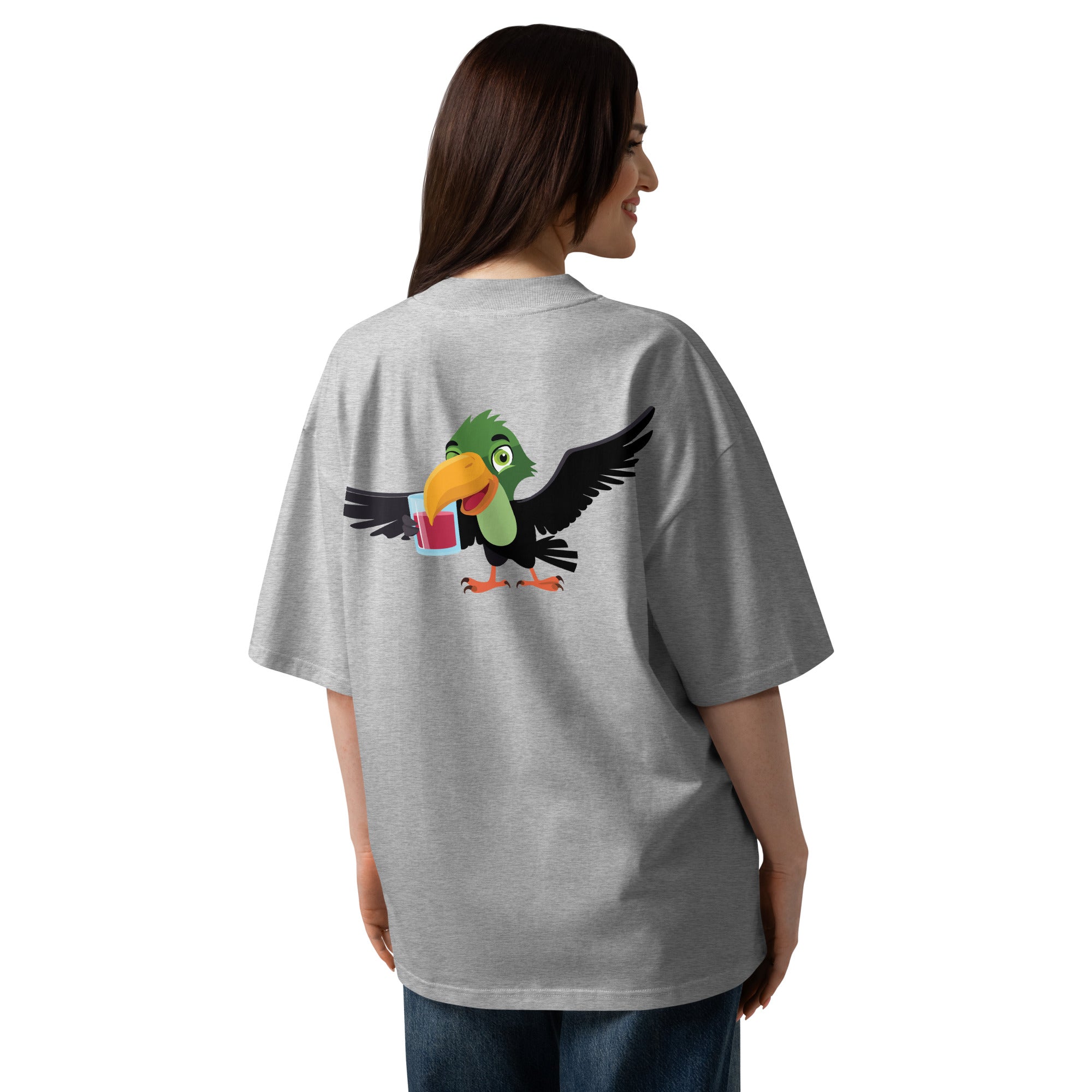 Person wearing a gray t-shirt with a colorful parrot graphic on the back.