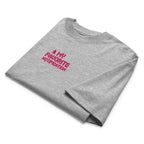 Gray t-shirt with pink text on a white background
