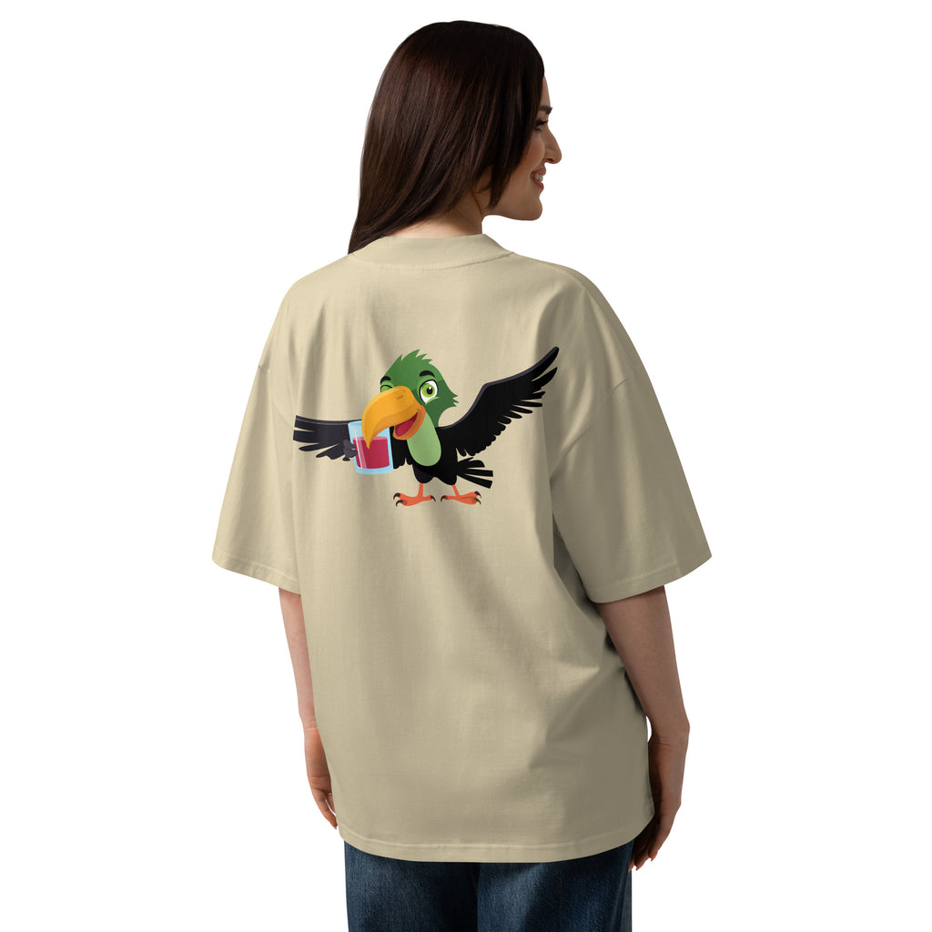 Person wearing a beige t-shirt with a colorful parrot graphic on the back.