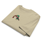 Folded beige t-shirt with a colorful graphic on a white background