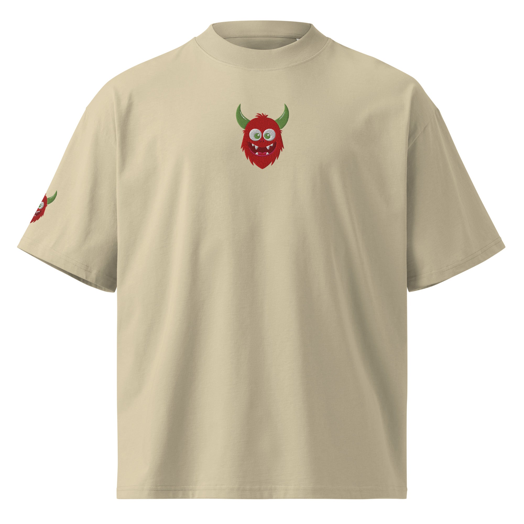 Beige t-shirt with a red monster face design on a white background