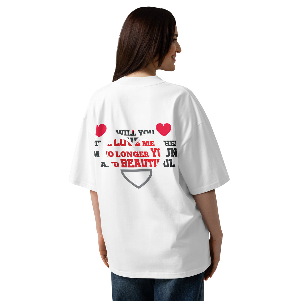 Person wearing a white t-shirt with text and heart designs on the back.