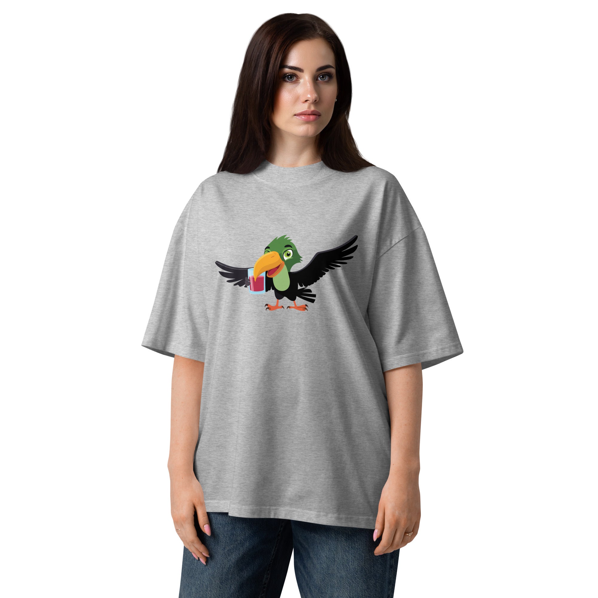 Woman wearing a gray t-shirt with a colorful parrot graphic on a white background