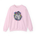 Pink sweatshirt with a colorful graphic of a person in a hoodie on a white background