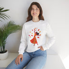 Woman wearing a white sweatshirt with a colorful graphic design sitting on a white surface.
